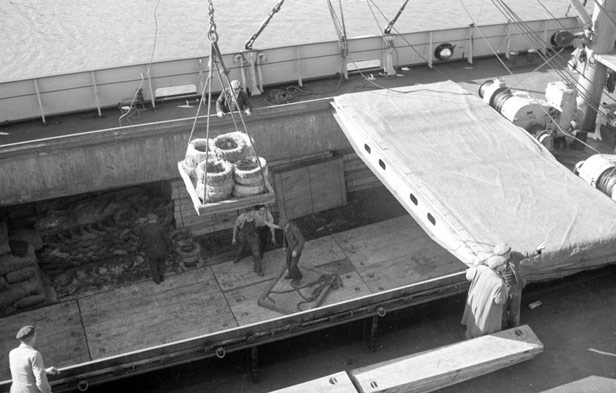 Unloading pallet of tyres at City Docks