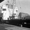 Loading tea in chests for export to Belfast, November 1962