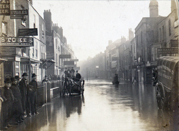 Milk Street in the centre of Bristol during the floods of 1882