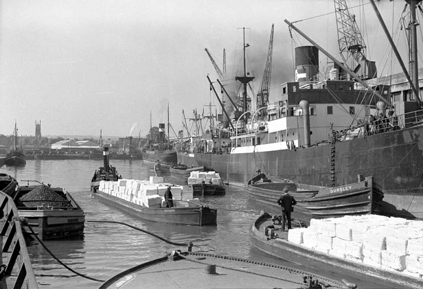 Tugs with trains of barges