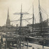 Small sailing vessels tied up at the Mud Dock