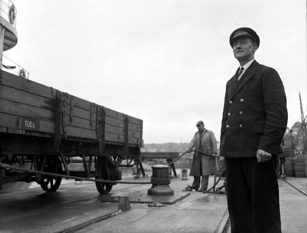Foreman (A. Harris supervising railway wagon capstan operation, September 1958